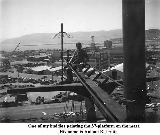 Roland Truitt painting the 37-platform on the mast.